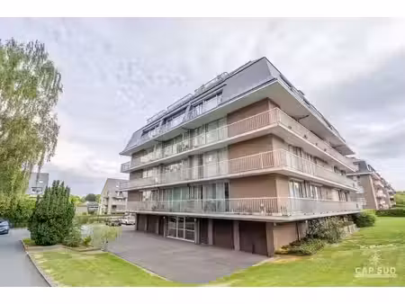 app. 2 ch. avec terrasse tout autour  parking