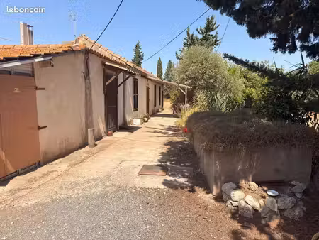 maison à rénover avec terrain + hangars