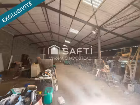 terrain constructible viabilisé plus hangar de 400m2