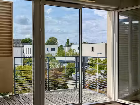 appartement t3 couëron - 64 m2 balcon  2 parkings & local