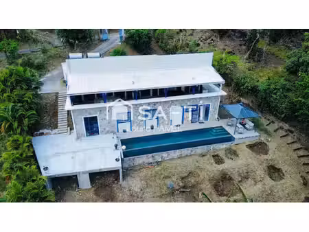 maison t4  studio  piscine à débordement
