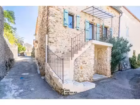 maison de village en pierre rénovée avec double carport
