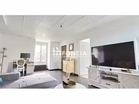 en centre ville appartement 4 pièces avec places de parking et une cave