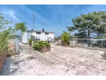 appartement 5 pièces - 4 chambres - terrasse - parkings sous sol
