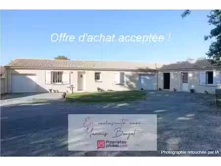 ensemble immobilier de 2 maisons louées avec garages et jardins
