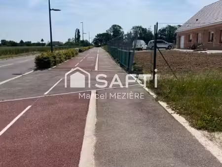 beau terrain plat.possibilité d'acquérir une parcelle de 1000 m2