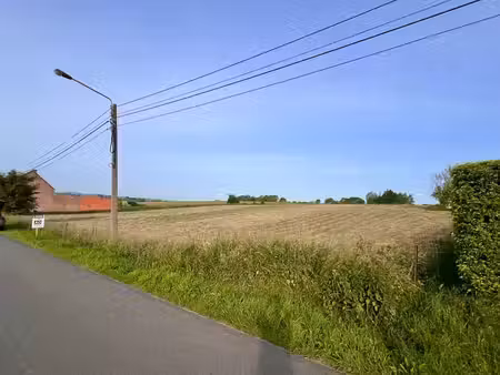 terrain situé en partie dans une zone d'habitat à caractère