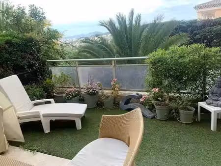 f3 meuble en rez-de-jardin avec parking et cave