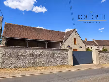 grange fermée avec hangar ouvert et jardin