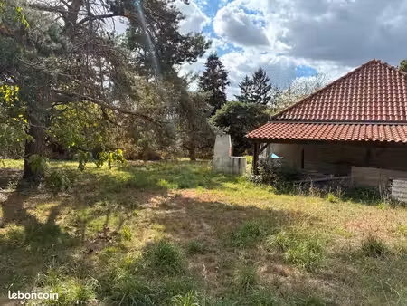 vend terrain avec une maison