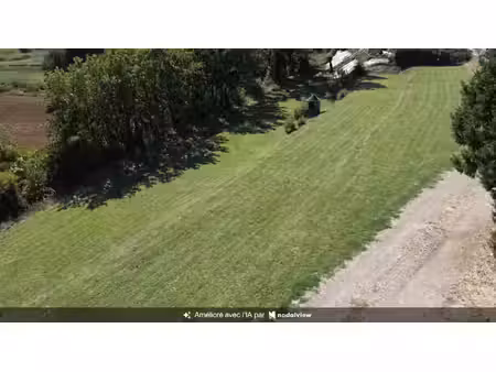terrain constructible de 1 000 m2 avec vue dégagée  au calme et proche des commodités