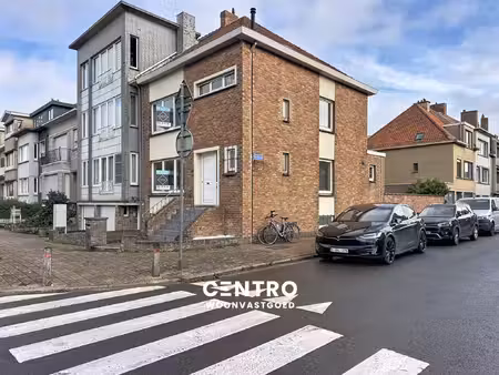 smaakvol afgewerkte woning met 3 sllpks  garage én zuidger. tuin!
