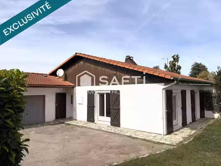 maison de plain-pied avec 3 chambres et garage sur terrain de 520 m²