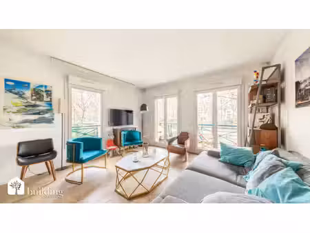 neuilly face seine - appartement 3 pièces avec balcon et loggia