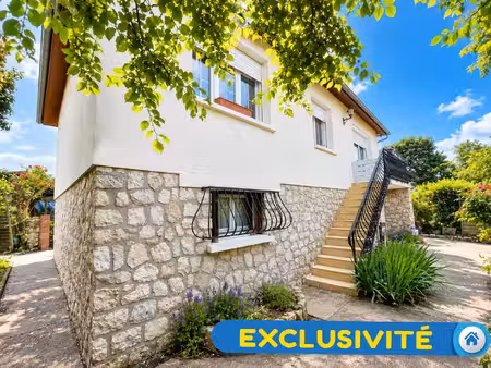 maison indépendante avec studio en rez-de-jardin  sous-sol e