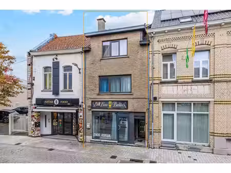 verhuurde opbrengsteigendom bestaande uit handelspand en duplexappartement in het centrum 