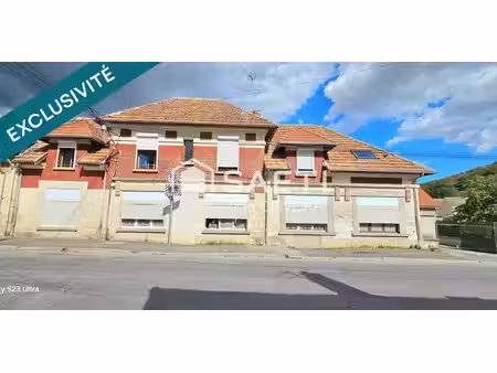 immeuble 7 lots ( 6 apparts ) + dépendance de 150m2 env cour offrant un rendement 8 %. inv
