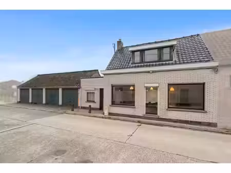charmante woning met polderzicht  bouwgrond & 4 garages