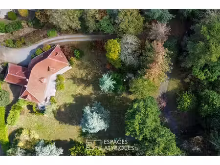 maison familiale et son parc arboré en fond d'impasse à orvault bourg