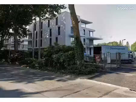 garage fermé en sous-sol avec porte motorisée - lambersart hippodrome