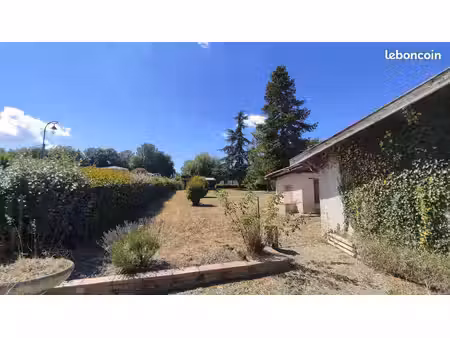 garage avec terrain à bâtir