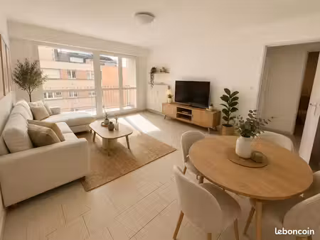 f2 - 55m2 proche gare - balcon et parking