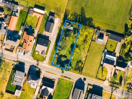 top gelegen bouwperceel van 990 m² met een breedte van 18 m.