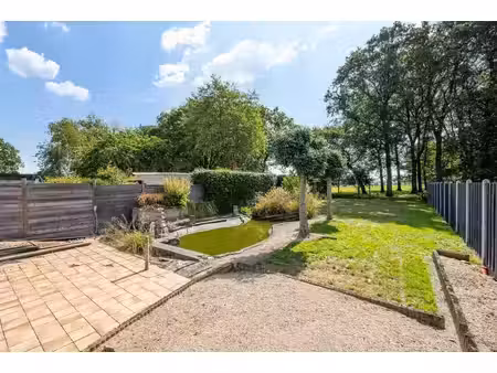 te renoveren halfopen woning met inpandige garage  grote werkruimte (ca. 145m²) en aangena