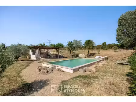 une ancienne ferme de caractère ouverte sur la campagne