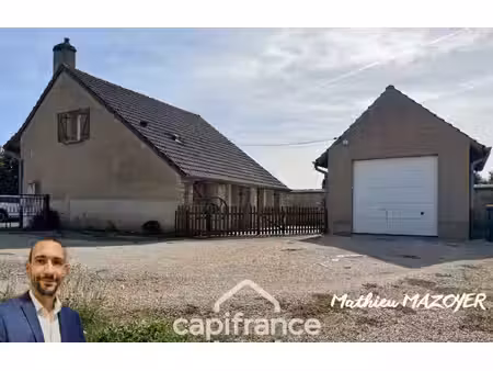 maison en pierre de 1865 – 3 chambres  garage et jardin : une belle opportunité à bey
