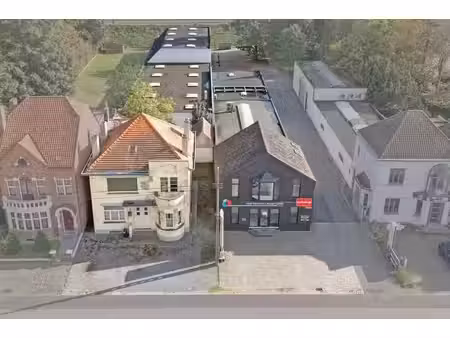 bedrijfsgebouw met kantoren en magazijnen langs de n43 in...