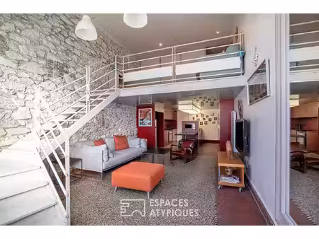 une ancienne imprimerie transformée en duplex contemporain