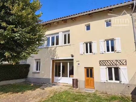 deux maisons mitoyennes avec garage et jardins