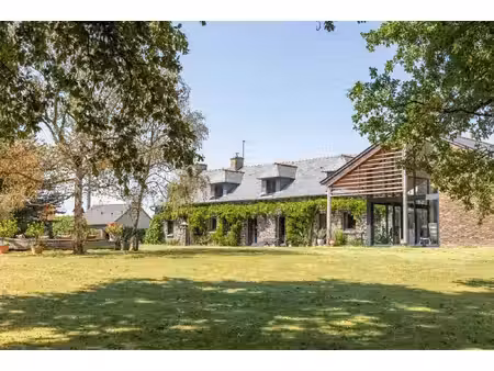 à l'ouest de rennes  dans le bocage breton  une longère rénovée et son parc de près de 6..