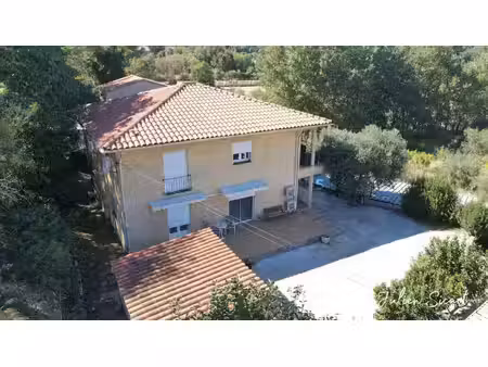 maison 4 faces de 213 m² habitables – 2 appartements t4 – terrain de 535 m²