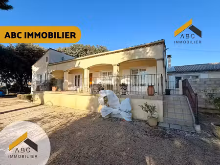 maison avec grand jardin et garage en plein calme