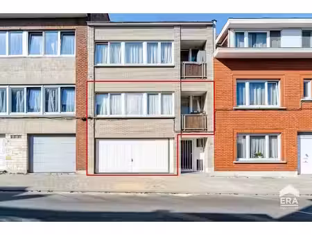 immeuble de rapport avec 2 appartements  garage et jardin