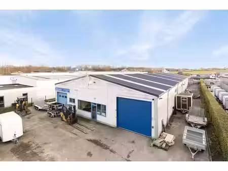bâtiment professionnel avec habitation à vendre – merchtem