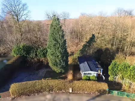 joli bungalow situé à l'orée du bois sur +- 7 ares