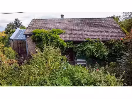 bungalow et terrain à bâtir situés sur les hauteurs d'heusy