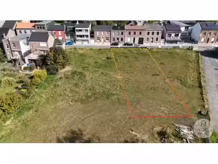 ? terrain à bâtir de 696 m² à heure-le-romain