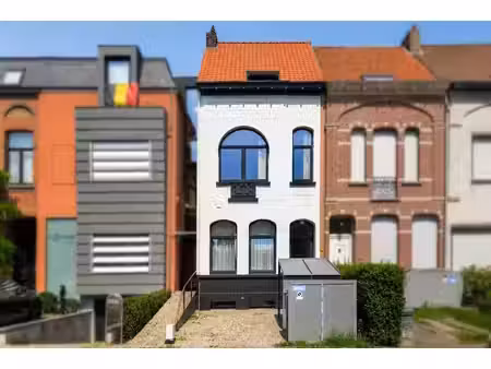 opbrengsteigendom met 2 entiteiten  tuin en autostaanplaats