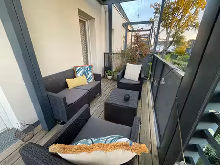 appartement centre bourg de sautron 3 pièces 66 m² avec balcon et place parking privative 