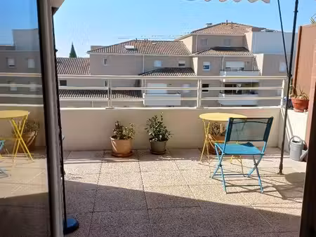 appt 2 pièces  ensoleillé  terrasse 14 m²  parking  cuisine neuve  clim  calme  tbe