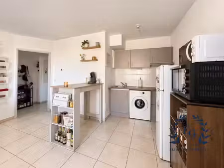 un investissement locatif - t2 avec belle terrasse et garage fer