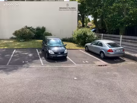 place parking sécurisée