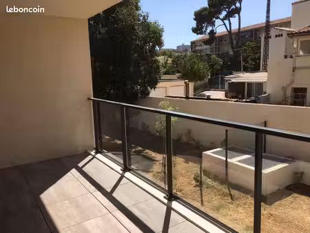 beau t2 immeuble neuf les routes -terrasse -parking - climatisation