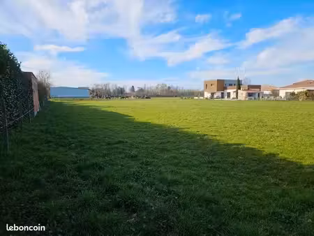 terrain 2 590 m² longages