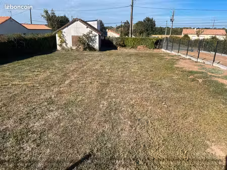 terrain 673 m² + garage 50 m²