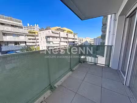 appartement lyon 1 pièce avec balcon sur jardin et garage en sous-sol